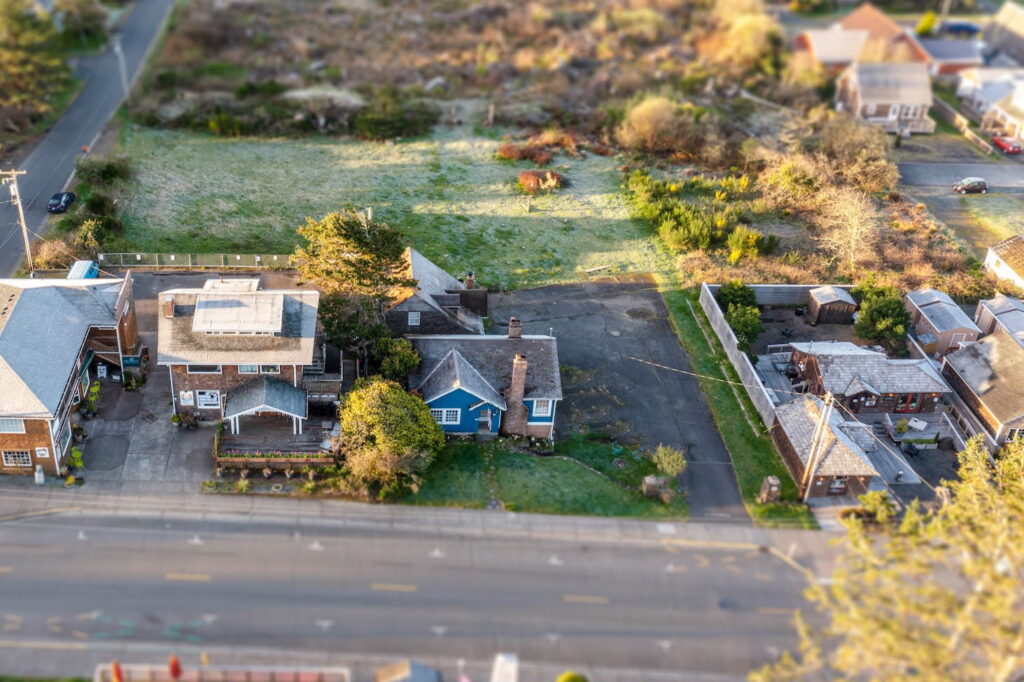 Mixed-use land property in Manzanita Oregon featuring approximately 1 acre of residential land and 10,000 square feet of commercial development potential on Laneda Avenue.